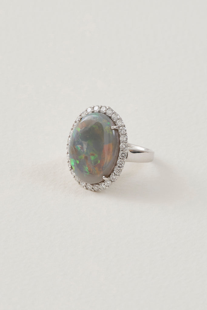 solid opal ring with diamond halo - lightning ridge opals