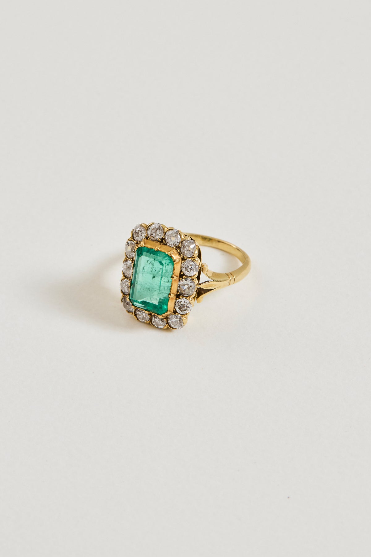 Vintage Emerald and Diamond Cluster Ring