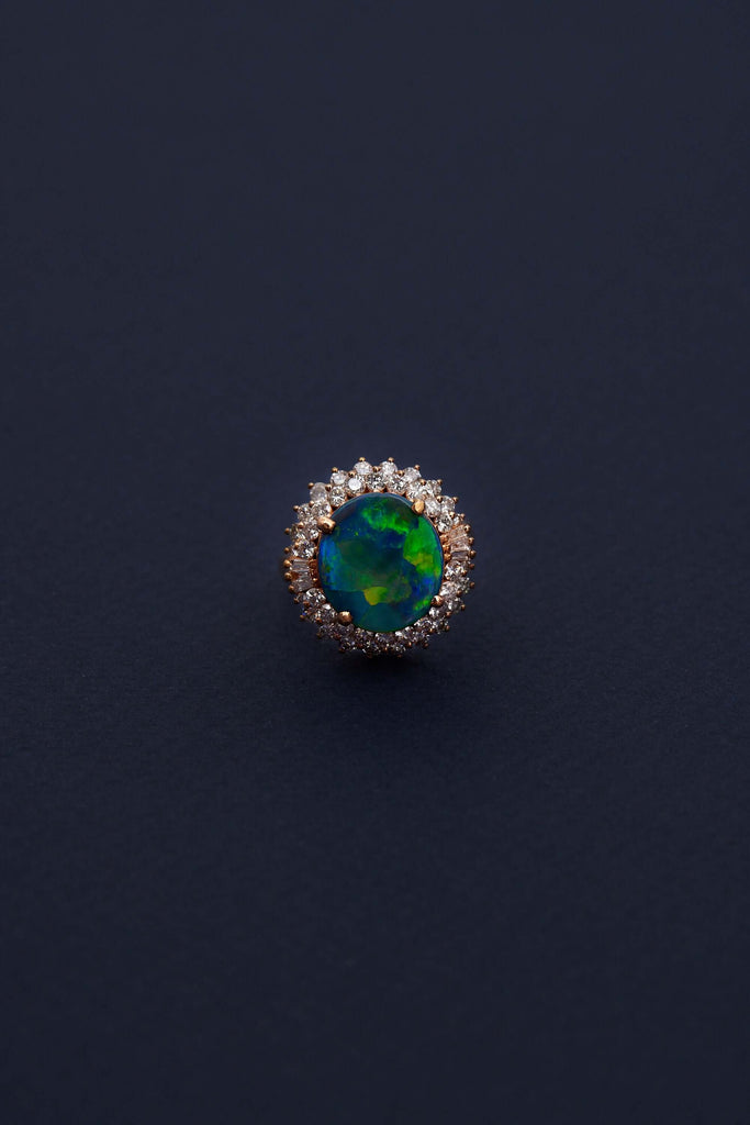 solid opal and diamond ring with 18ct white gold opal is from lightning ridge available at keshett