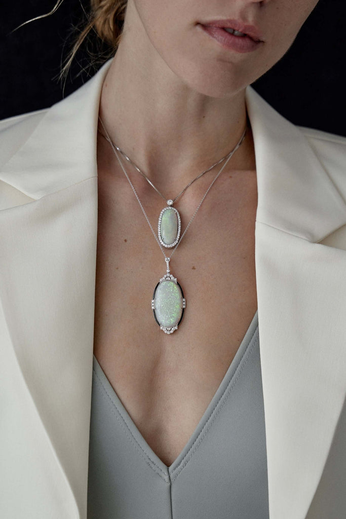 solid opal and diamond pendant in 18ct white gold opal is from lightning ridge available at keshett