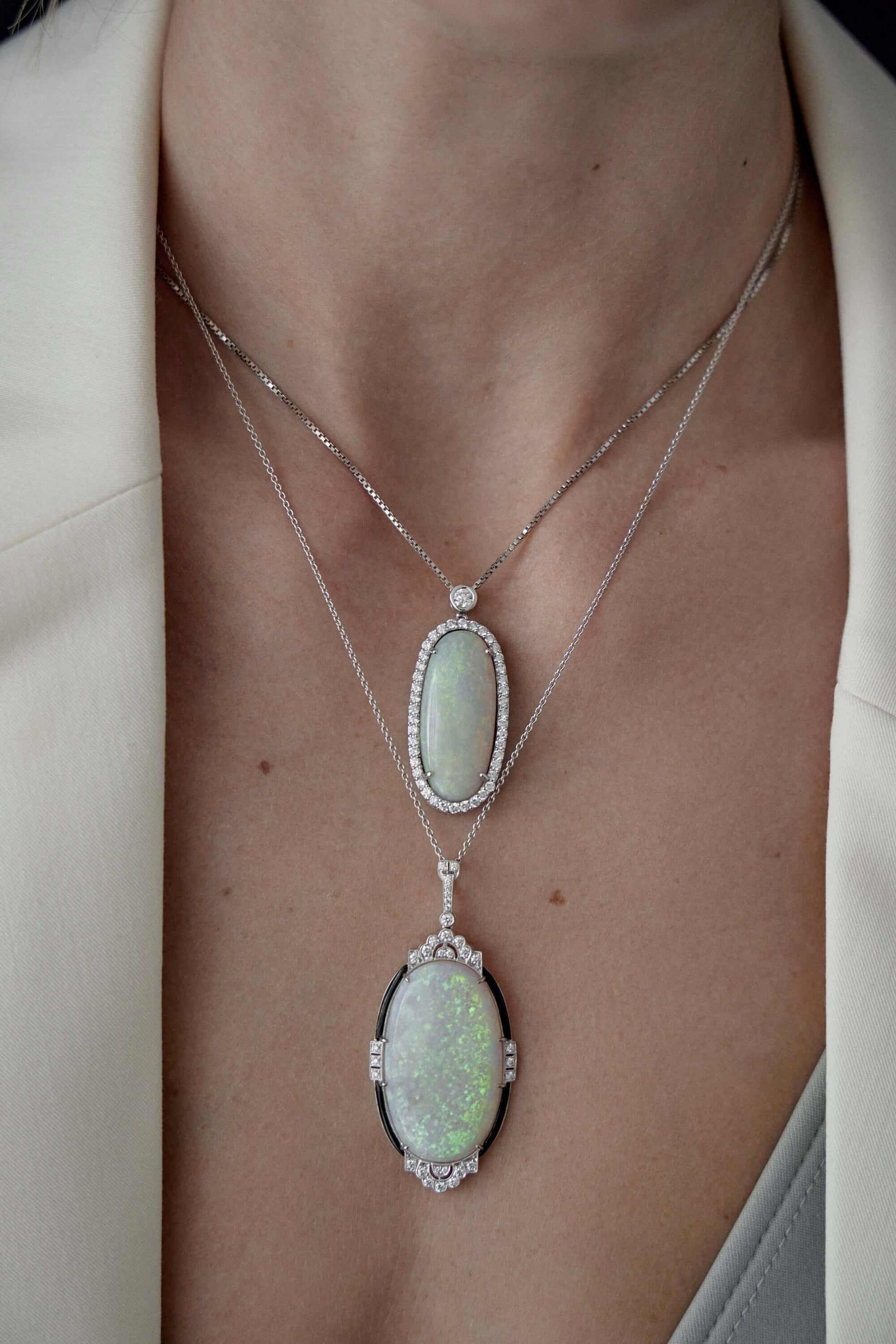 solid opal and diamond pendant in 18ct white gold opal is from lightning ridge available at keshett