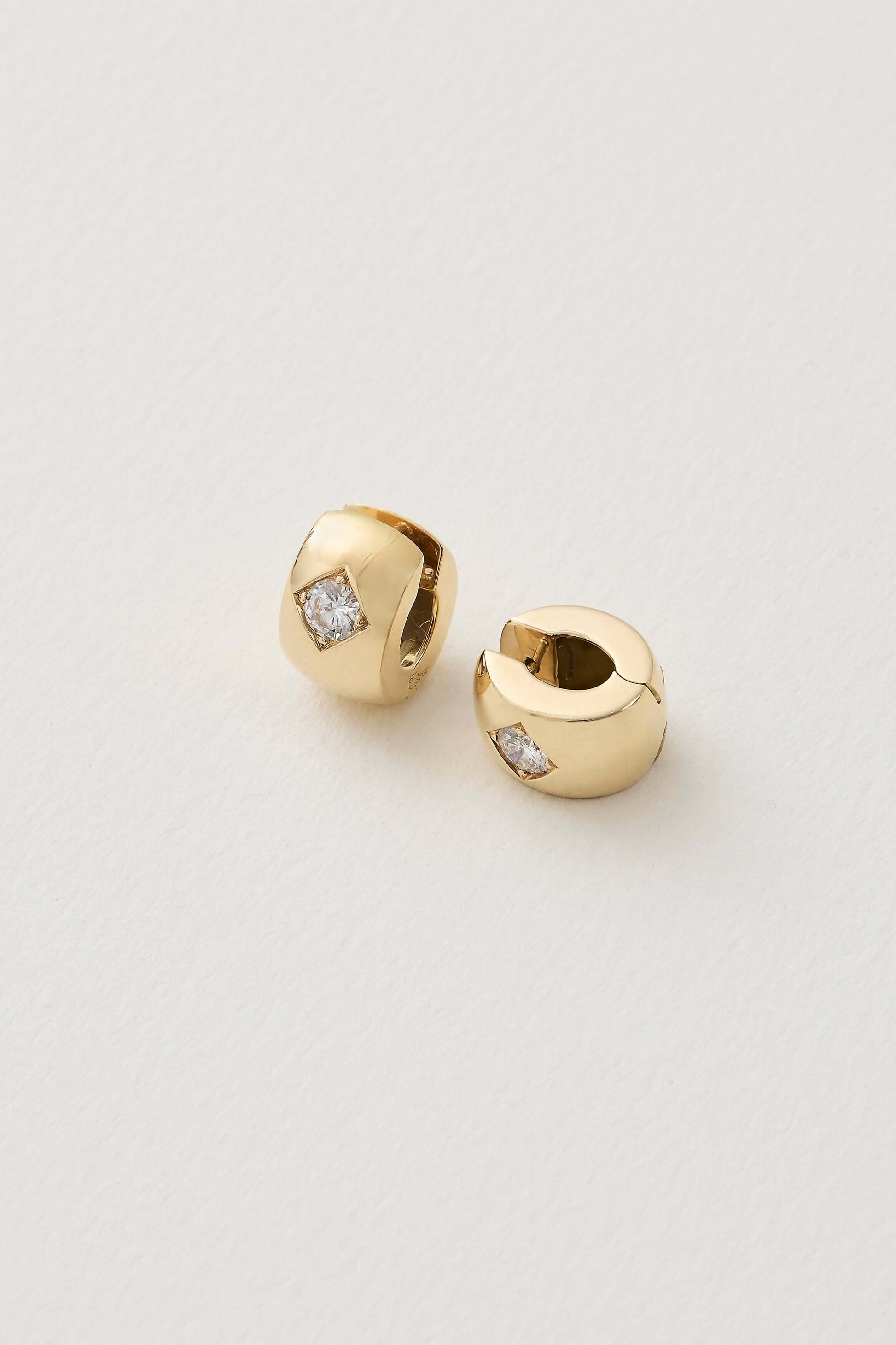 diamond and gold mid century vintage huggies earrings 