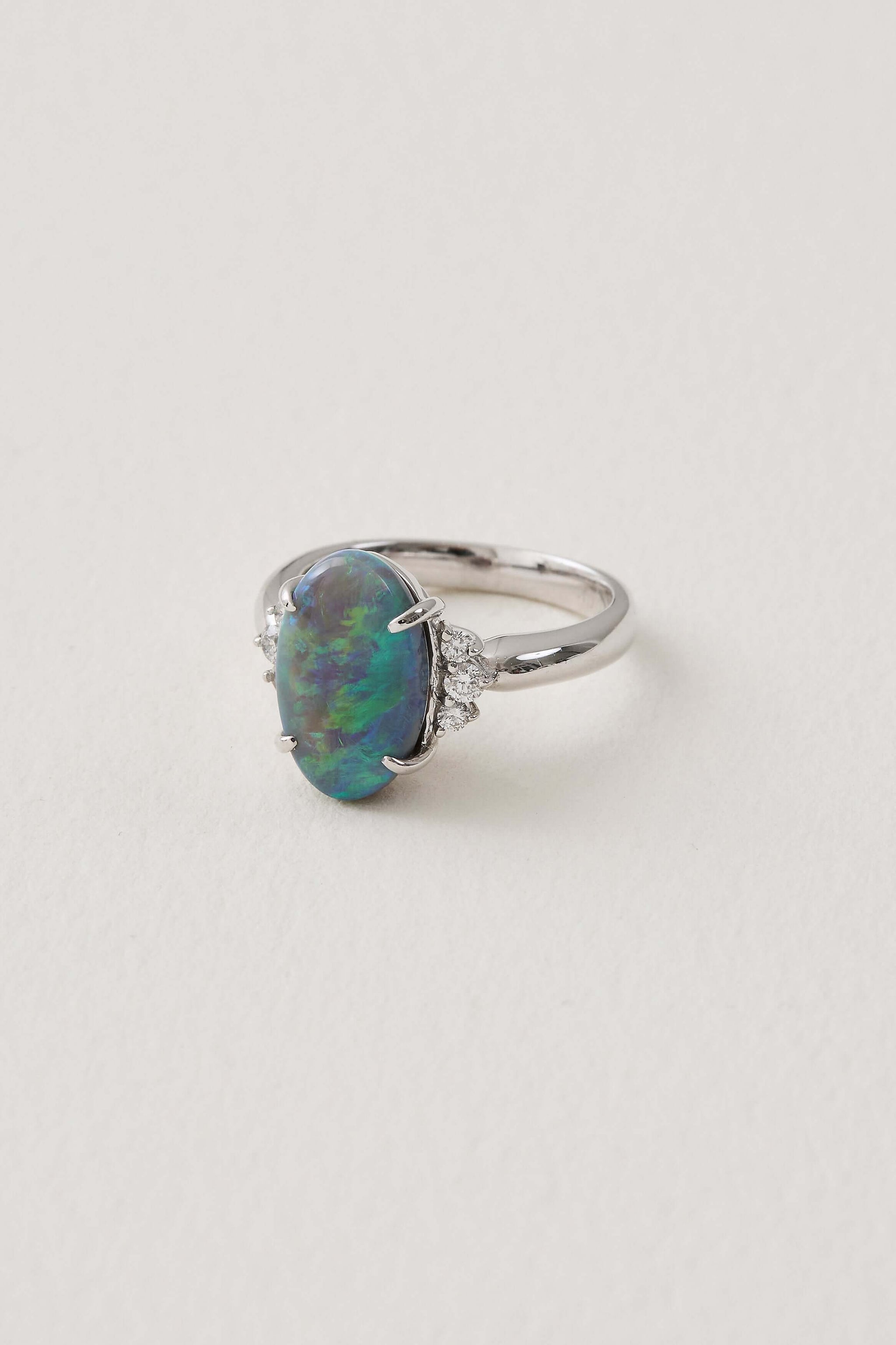 solid opal and diamond ring with 18ct white gold opal is from lightning ridge available at keshett