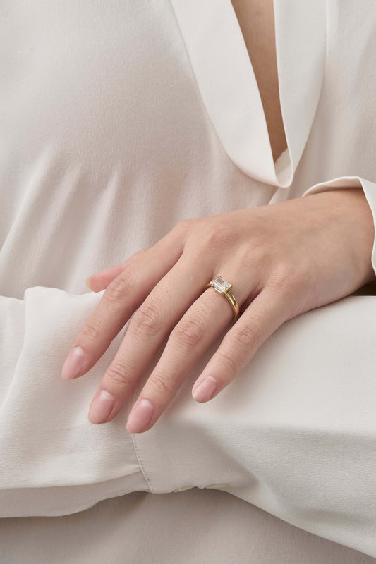 Radiant Half Bezel East-West Ring