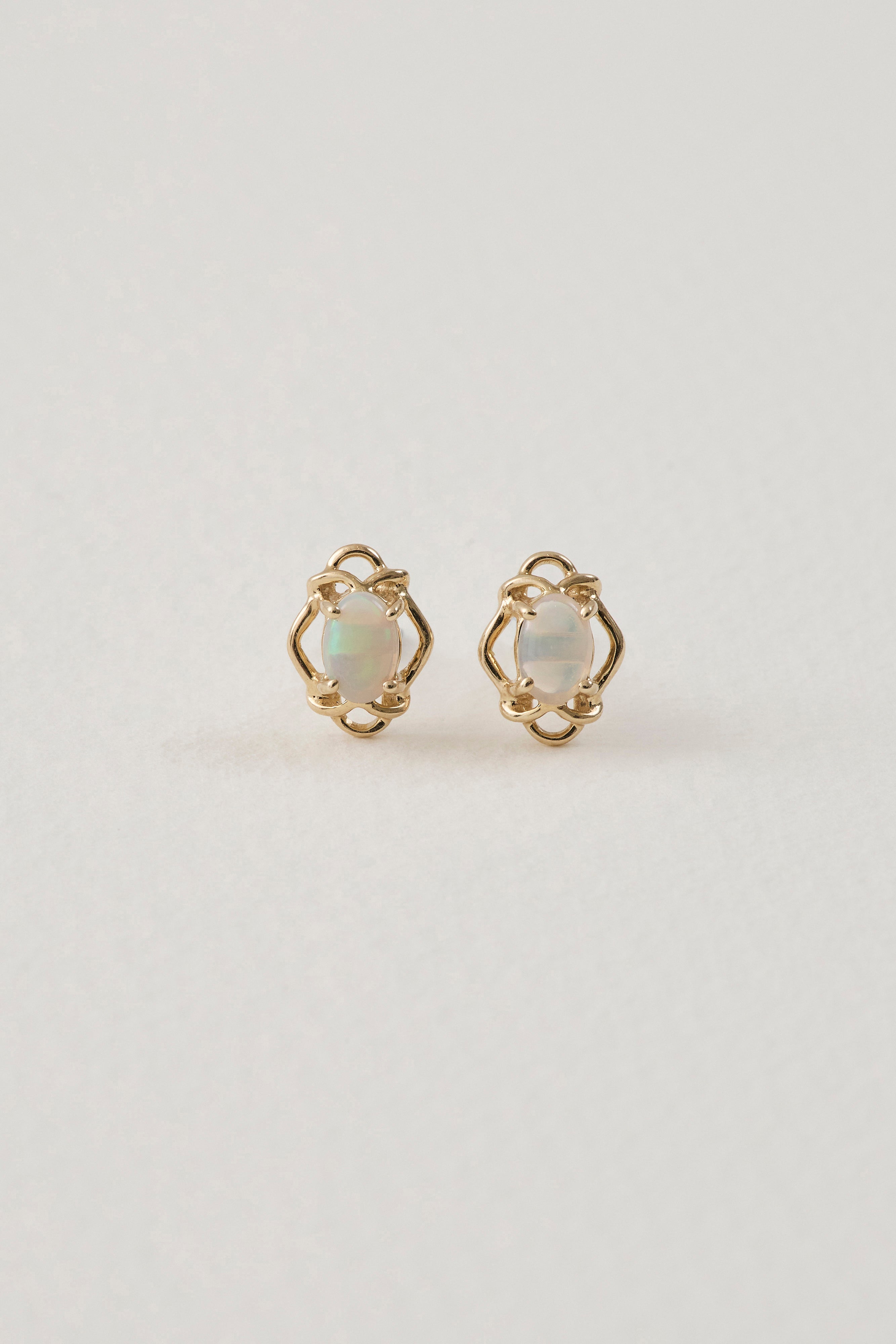 Opal and 9ct yellow gold studs  