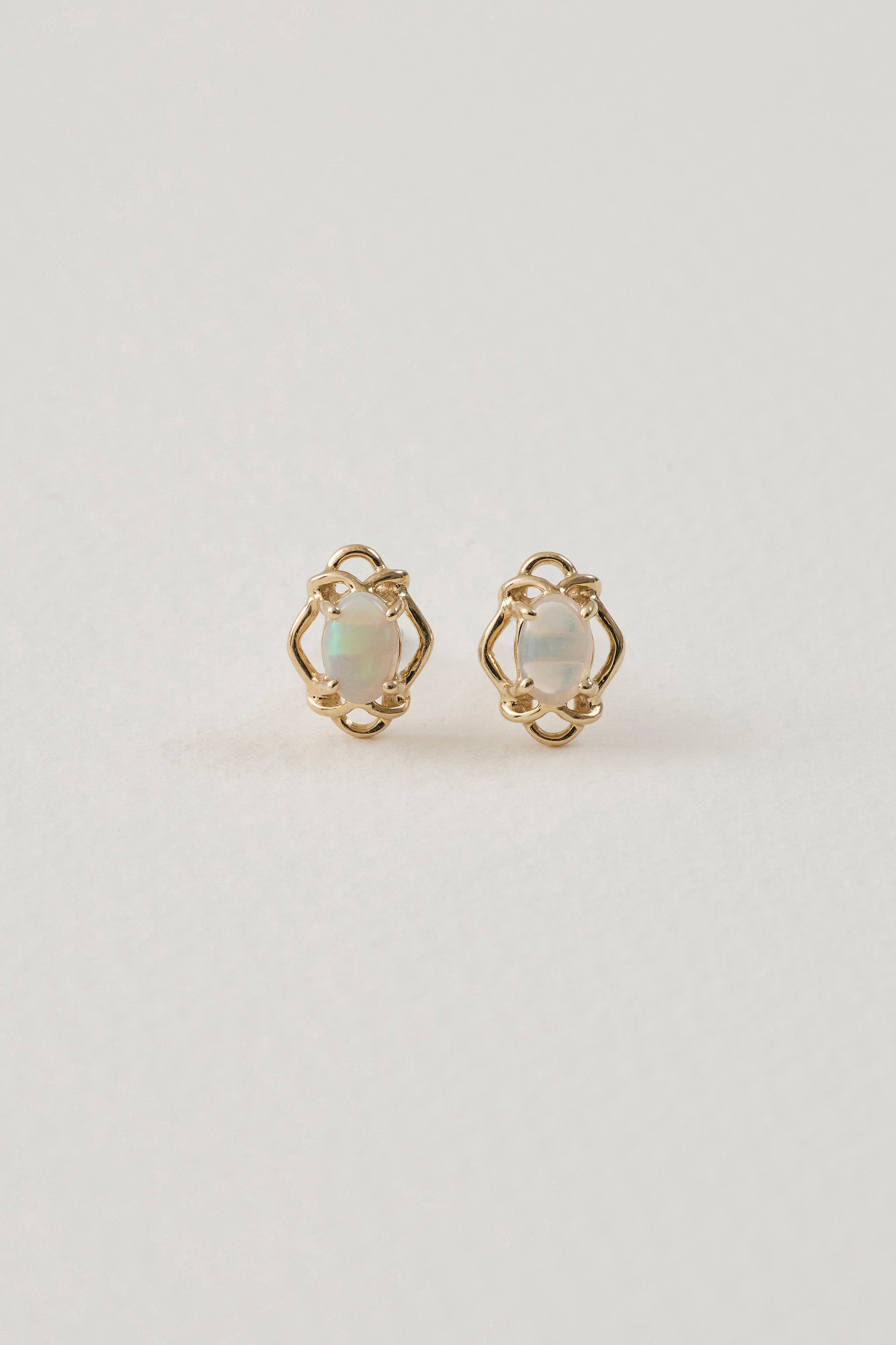 Opal and 9ct yellow gold studs  