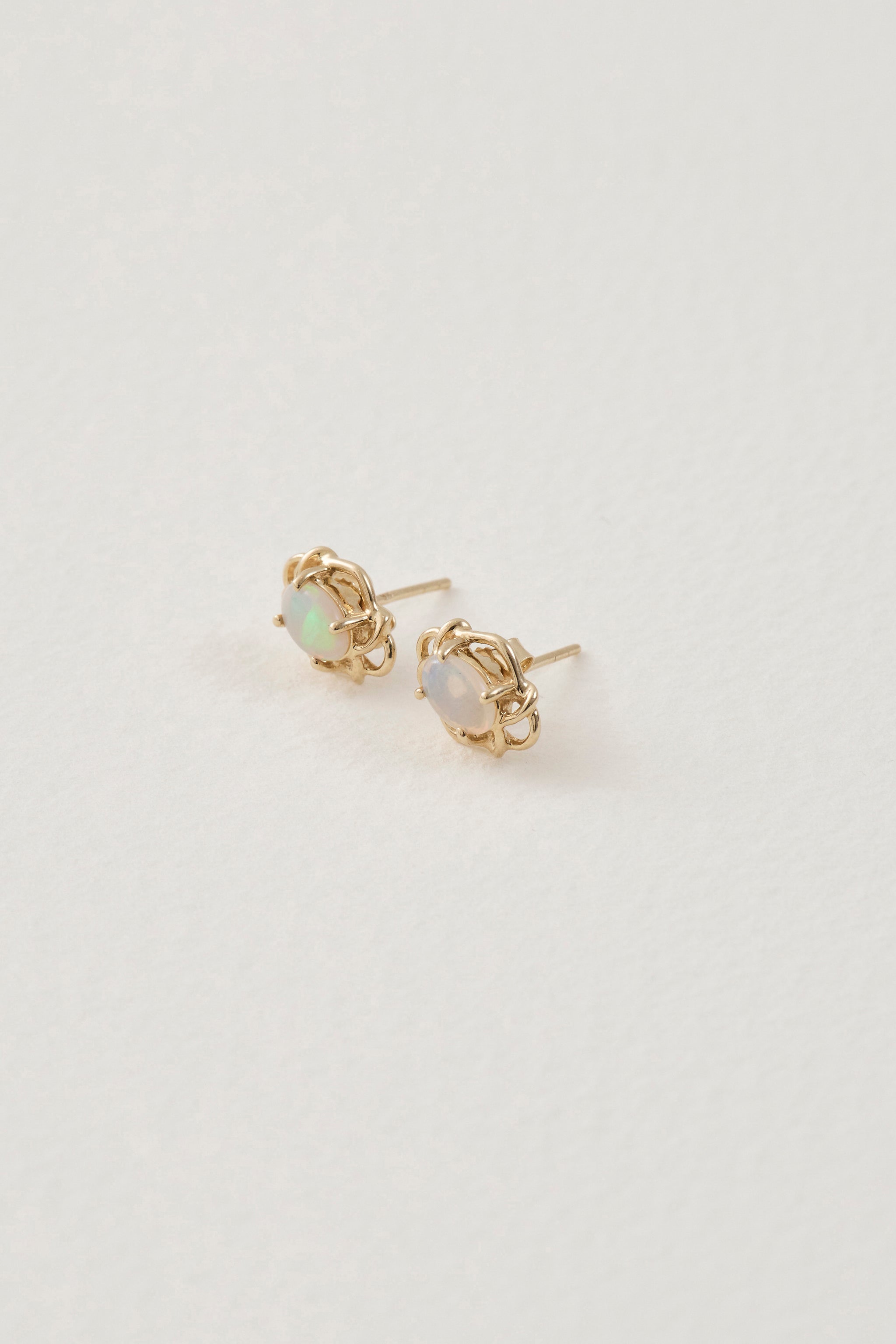 Opal and 9ct yellow gold studs  